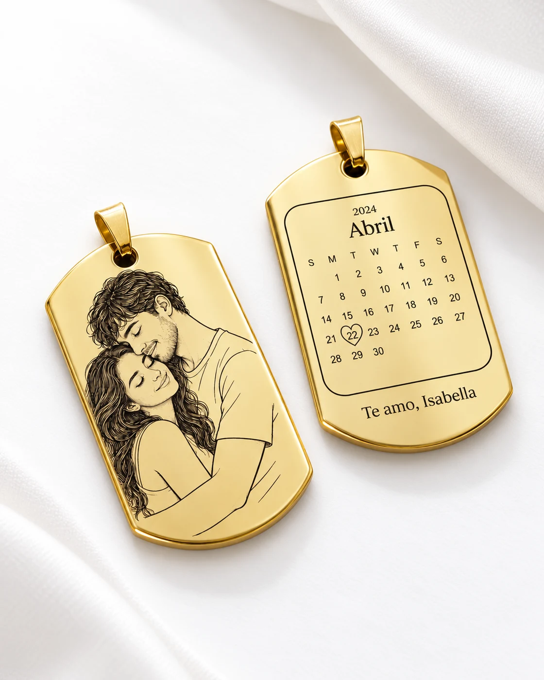 Illustrative studio example of a gold keychain, showing a couple's line-art portrait and a personalized calendar on the reverse